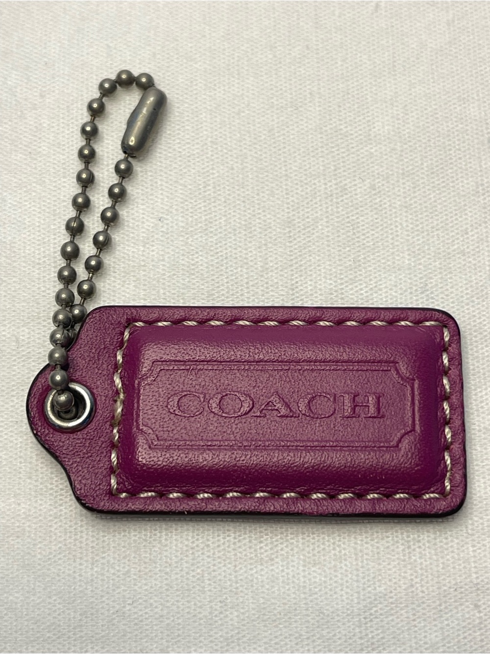 COACH Plum Leather Hang Tag with Ball Chain